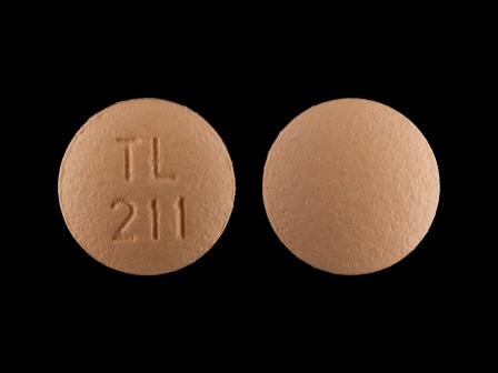 TL 211: Cyclobenzaprine Hydrochloride 5 mg Oral Tablet