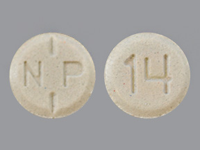 N P 14 grayish white tablet